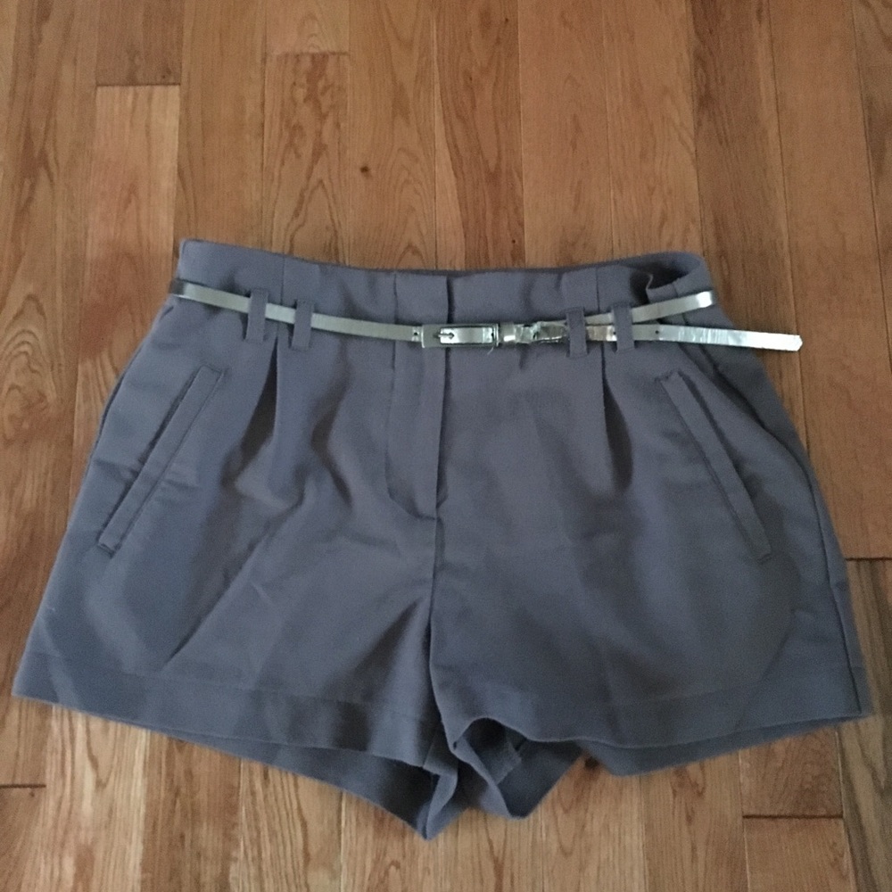 Gray shorts with silver belt included